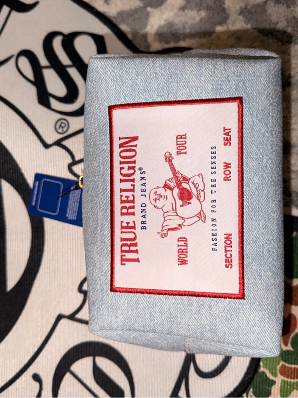 True Religion Light Blue Denim Zip Pouch with Red Tag